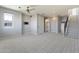 Spacious loft area with carpet flooring and a staircase at 16510 N 92Nd St # 1003, Scottsdale, AZ 85260