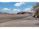 Street view of a road with a large building in the distance at 16510 N 92Nd St # 1003, Scottsdale, AZ 85260