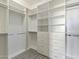 Large walk-in closet with ample shelving and hanging space at 16510 N 92Nd St # 1003, Scottsdale, AZ 85260
