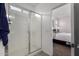 Clean bathroom with a shower and linen closet at 17244 W Lynx Rd, Goodyear, AZ 85338
