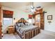 Spacious bedroom with king-size bed and ensuite bathroom access at 18064 W Buena Vista Dr, Surprise, AZ 85374