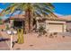 Single-story home with desert landscaping and a two-car garage at 18064 W Buena Vista Dr, Surprise, AZ 85374