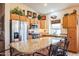 Kitchen with stainless steel appliances and granite countertops at 18064 W Buena Vista Dr, Surprise, AZ 85374