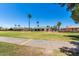 Residential home with backyard view and green space at 18202 N 99Th Dr, Sun City, AZ 85373