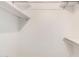 Spacious closet with double hanging rods and shelves at 18202 N 99Th Dr, Sun City, AZ 85373
