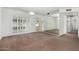 Spacious dining room with glass doors leading to the backyard at 18202 N 99Th Dr, Sun City, AZ 85373