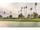 Waterfront view of a lush golf course at 18202 N 99Th Dr, Sun City, AZ 85373
