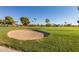 Sand trap on a lush green golf course at 18202 N 99Th Dr, Sun City, AZ 85373