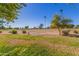 View of a lush green golf course from the property at 18202 N 99Th Dr, Sun City, AZ 85373