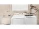 Laundry room with Samsung washer and dryer at 18202 N 99Th Dr, Sun City, AZ 85373