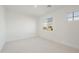 Light-filled bedroom with window offering an outdoor view at 19033 W Rose Ln, Waddell, AZ 85355