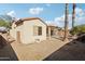 Desert landscape with covered patio and gravel at 19241 N Emerald Cove Way, Surprise, AZ 85387