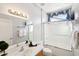 Clean bathroom with shower/tub combo and updated vanity at 19241 N Emerald Cove Way, Surprise, AZ 85387