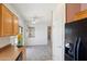 Bright kitchen features ample cabinetry, and a view to the backyard at 19241 N Emerald Cove Way, Surprise, AZ 85387