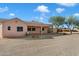 Single story home with covered patio and large backyard at 20232 W Mazatzal Dr, Wittmann, AZ 85361