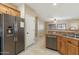 Kitchen features stainless steel appliances and wood cabinets at 20232 W Mazatzal Dr, Wittmann, AZ 85361