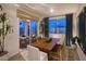 Bright dining room with sliding doors leading to a patio at 20757 N 223Rd Ave, Surprise, AZ 85387