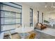 Stylish dining area with white table and light wood chairs at 21 E 6Th St # 617, Tempe, AZ 85281