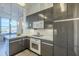 Modern white and gray kitchen with stainless steel appliances at 21 E 6Th St # 617, Tempe, AZ 85281