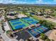 Aerial view of tennis and pickleball courts, plus surrounding landscape at 25801 N Abajo Dr, Rio Verde, AZ 85263