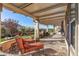 Relaxing patio area with lounge chairs and a pergola at 25971 W Taro Dr, Buckeye, AZ 85396