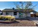 Charming single story home with well-manicured front yard at 261 W 21St Ave, Apache Junction, AZ 85120