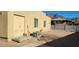 Back of house with AC unit and double doors at 321 S Bridge St, Superior, AZ 85173