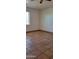 Living room features tile flooring and a ceiling fan at 321 S Bridge St, Superior, AZ 85173