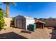 A backyard with shed and doghouse at 3428 W Vogel Ave, Phoenix, AZ 85051