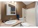 Clean bathroom with shower/tub combo, white vanity, and tiled floor at 3428 W Vogel Ave, Phoenix, AZ 85051