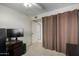 Bedroom with a home office setup and large closet at 3428 W Vogel Ave, Phoenix, AZ 85051
