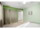 Bedroom with ceiling fan, and light green walls at 3428 W Vogel Ave, Phoenix, AZ 85051