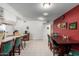 Kitchen with dining area, features a wood table and green chairs at 3428 W Vogel Ave, Phoenix, AZ 85051