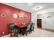 Dining area adjacent to the kitchen with a dark wood table at 3428 W Vogel Ave, Phoenix, AZ 85051