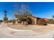 House exterior showcasing a side yard with desert landscaping at 3428 W Vogel Ave, Phoenix, AZ 85051