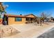 Front view of the house with driveway and landscaping at 3428 W Vogel Ave, Phoenix, AZ 85051