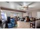 A living room with wood-look floors, and a ceiling fan at 3428 W Vogel Ave, Phoenix, AZ 85051