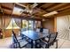 A covered patio with a table, chairs, and grill at 3428 W Vogel Ave, Phoenix, AZ 85051