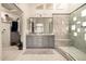Elegant bathroom with double vanity, large shower, and walk-in closet at 3479 E Esplanade Ct, Gilbert, AZ 85297