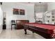 Game room featuring a pool table, bar area, and wall decor at 3479 E Esplanade Ct, Gilbert, AZ 85297