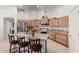 Well-equipped kitchen featuring granite counters and wood cabinets at 3479 E Esplanade Ct, Gilbert, AZ 85297