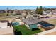 House with pool and shaded backyard, aerial view at 3737 W Morrow Dr, Glendale, AZ 85308