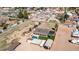 Aerial view showing a house with a pool, RV parking and surrounding landscape at 3737 W Morrow Dr, Glendale, AZ 85308