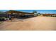 Large backyard with covered parking and storage structures at 3737 W Morrow Dr, Glendale, AZ 85308