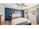Main bedroom with a king-size bed and an accent wall at 3737 W Morrow Dr, Glendale, AZ 85308
