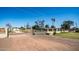 View of the property's entrance with a gate and driveway at 3737 W Morrow Dr, Glendale, AZ 85308
