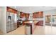 Modern kitchen with stainless steel appliances and island at 3737 W Morrow Dr, Glendale, AZ 85308