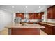 Modern kitchen with granite countertops and island at 3737 W Morrow Dr, Glendale, AZ 85308
