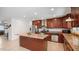 Spacious kitchen with island and stainless steel appliances at 3737 W Morrow Dr, Glendale, AZ 85308