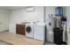 Bright laundry room with washer, dryer, and utility sink at 3737 W Morrow Dr, Glendale, AZ 85308